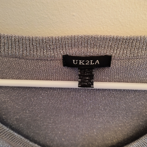 UK to LA silver top. Size Large. Color silver. Good condition - Picture 2 of 5